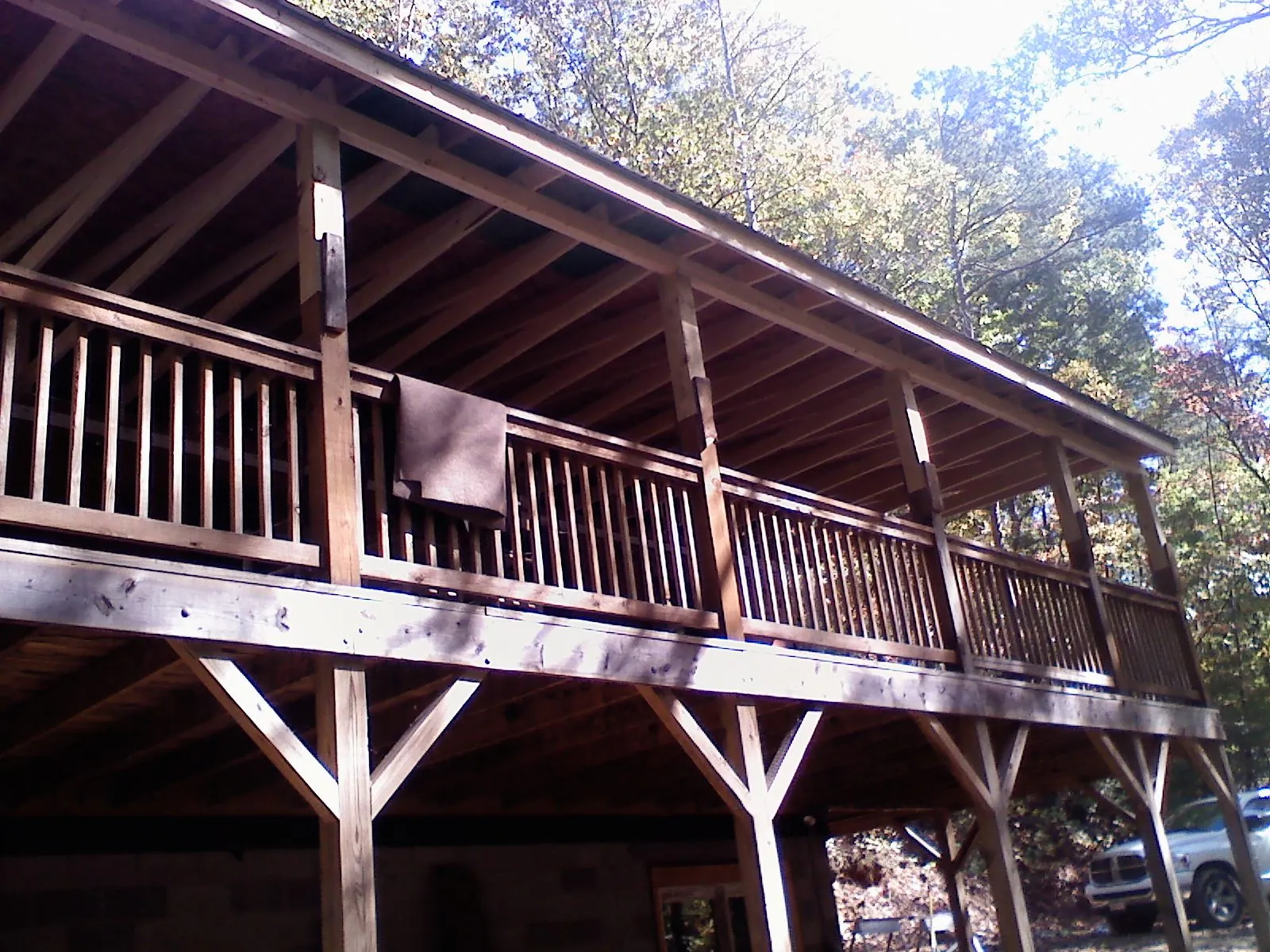 Timber framing under a new elevated porch and deck — Roof Leak Repair in Hot Springs Village by Roofing Brothers